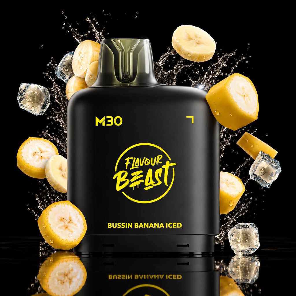 A black vape device labeled 'M30' and 'Flavour Beast' with 'Bussin Banana Iced' text, surrounded by floating banana slices, ice cubes, and golden light effects on a dark background.